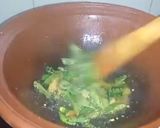 A picture of step 5 of Brinjal Curry in white gravy.