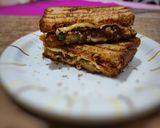 A picture of step 6 of Cheesy Sandwich with potato and green peas filling.