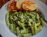 A picture of step 6 of Penne Pasta with Basil Walnut Pesto.