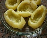 Foto del paso 1 de la receta: Papas rellenas con paleta cocida y sabor crema de verdeo