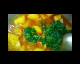 A picture of step 9 of Aloo palak.