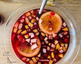 A picture of step 6 of Sangria 🍑 🍌 🍋 🥝 🍊.