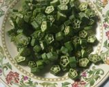 A picture of step 1 of Masaledar bhindi.