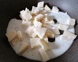 Foto del passaggio 6 della ricetta TORTELLINI ALL'ODORE DI RUCOLA RIPIENI DI ZUCCA CON MONTASIO E NOCI