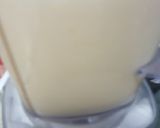 A picture of step 3 of Mango and cherry drink.