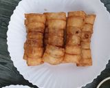 A picture of step 4 of Buffalo hot sauce rolls.