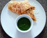 A picture of step 5 of Shezwan masala cheese Dosa roll.