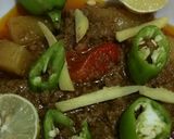 A picture of step 2 of Makhni alo qema.