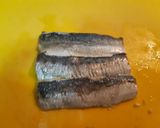 A picture of step 1 of Chilled Sardine Lasagna with Tomato Sauce.