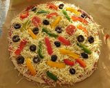 A picture of step 11 of Heart shaped Veg pizza.