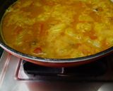 A picture of step 5 of Green Papaya, Moong Dal Curry (no onion, garlic) with Raita and.