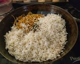 A picture of step 4 of Triple Schezwan fried rice.