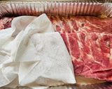 A picture of step 2 of Peppered BBQ St.Louis Ribs.