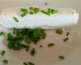 A picture of step 1 of Pomordorini e caprino cherry tomatoes stuffed with goat's cheese.