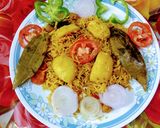 A picture of step 5 of Aalu soyabean pulav.