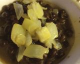 A picture of step 3 of Black Beans with Vinegar-Butter, Poached Onion.