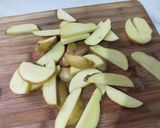 A picture of step 1 of Crispy potato wedges with spicy mango sauce.