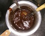 A picture of step 6 of Vanilla cake with chocolate frosting.