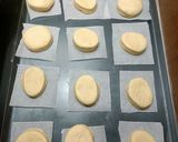 A picture of step 9 of Mardi Gras Chocolate Donuts.