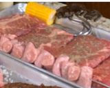 Foto del paso 3 de la receta: Asado de picaña, aguja, salchicha, chorizo argentino y español en asador ARTE & CARNE
