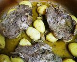 A picture of step 8 of Pork Chops with Honey, Soy Sauce, Mustard, and Lemon Baby Potatoes in a Dutch Oven.