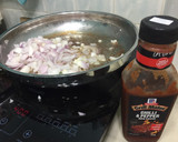 A picture of step 2 of Bacon And Onion In BBQ Sauce Open Sandwich.