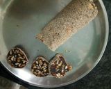 A picture of step 14 of #bandhan# khajur ke dry fruits roll.