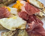 A picture of step 6 of Fried Artichokes with Eggs and Iberian Ham.
