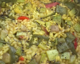 Foto del paso 12 de la receta: Arroz seco de verduras (calabacín, berenjena 🍆 pimientos 🫑...y pollo al ajillo