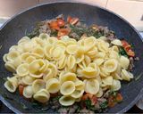 A picture of step 6 of Orecchiette with Sausage and Arugula.