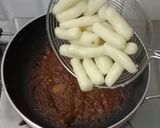 A picture of step 8 of Korean chewy garlic Potato in Red sauce.