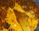 A picture of step 14 of Spicy coconut milk chicken curry.