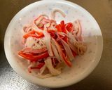 A picture of step 2 of Onion and Crab Sticks Salad.