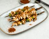 A picture of step 3 of Japanese yakitori (chicken thigh).