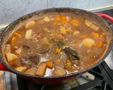 A picture of step 26 of Beef Bourguignon with Sweet Potato, Carrots, Turnips, and Mushrooms.