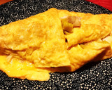Foto del paso 4 de la receta: Tortilla de pescado, cebolla y piparras