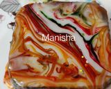 A picture of step 12 of Parle-G Biscuits Brownie with Mirror Glaze Effect.