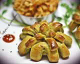 A picture of step 7 of Fusilli pasta in red sauce with herbed pesto bread.