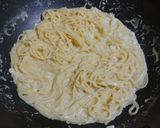 Une image de l'étape 3 de Spaghetti ail Parmesan façon one-pot.