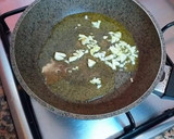 Foto del paso 2 de la receta: Chipirones frescos rellenos en salsa de cebolla y tikka curry