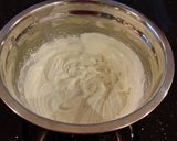 A picture of step 20 of White Chocolate Truffle Cupcakes with Whipped White Chocolate Mascarpone Frosting.