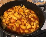 Une image de l'étape 9 de Pommes de terre à la tomate, coriandre et épices.