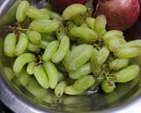 A picture of step 1 of Green grapes and pomegranate juice.