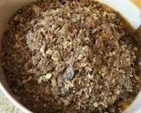 A picture of step 1 of Alpen and Lotus biscoff squares.