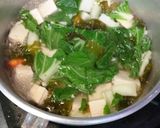 Foto langkah ke 4 dari resep Sup tahu sawi asin.