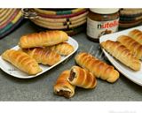 A picture of step 13 of Nutella stuffed caterpillar buns.