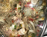 Foto del paso 5 de la receta: Arroz con cuerpos de centollo o cangrejo, cigalas, almejas y calamar