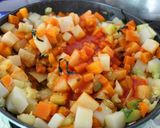 A picture of step 10 of Red Enchiladas with Vegetable Picadillo.