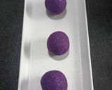 A picture of step 5 of Blueberry flavoured Coconut ladoos.