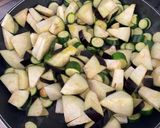A picture of step 2 of Greek peppers and sausage bake with feta.